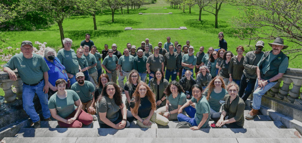 Picture of Duke Farms Staff, gathered on a wide staircase.